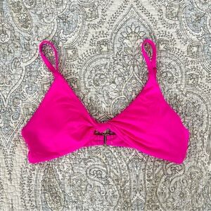 Dippin Daisy’s pink bikini top